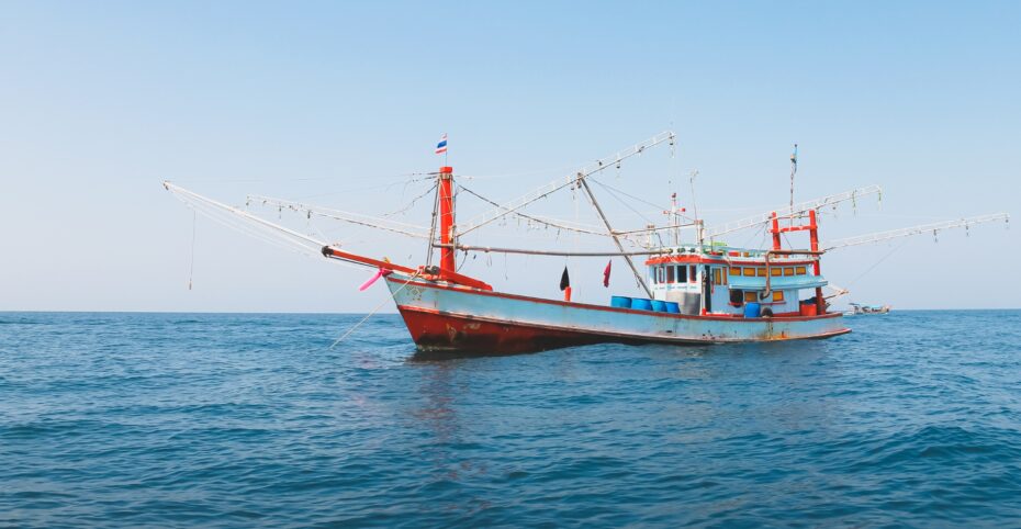 Image of a commercial fishing boat in the open ocean